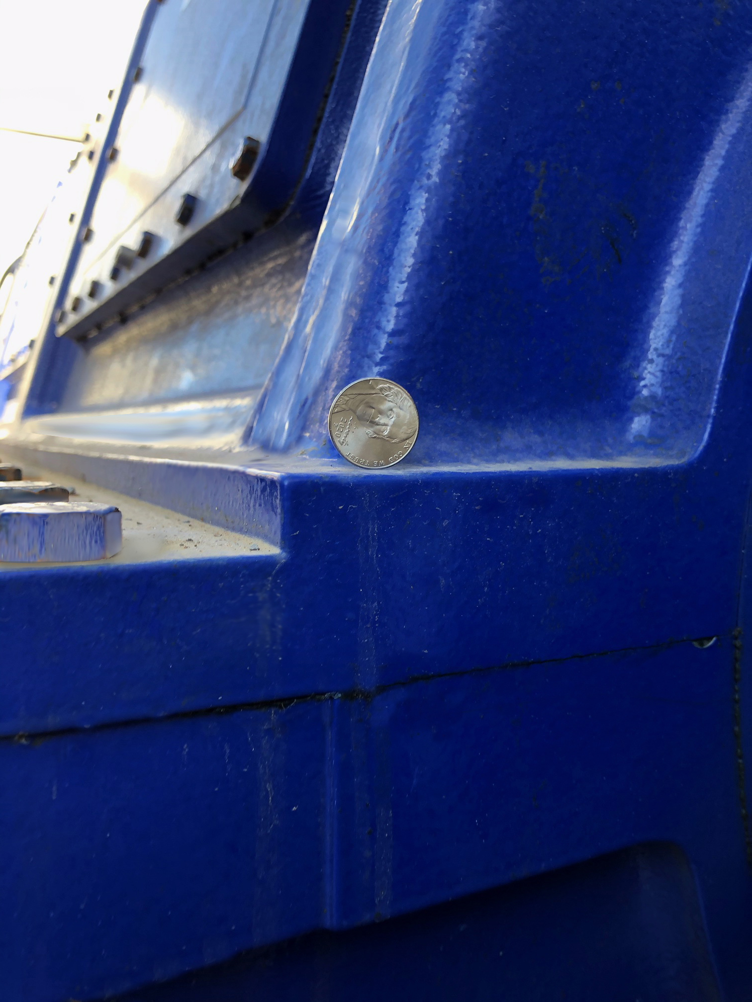 An informal vibration test of the newly installed VoreconNX variable speed drive was also performed at its new home in Louisiana: A coin was successfully balanced on the drive casing while the drive was in operation!